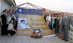Posing with Banner